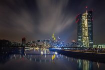 Germany, Hesse, Frankfurt, cityscape with ECB Tower illuminated at night — Stock Photo