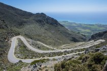 Greece, Crete, serpentine road leading down to the south coast — Stock Photo