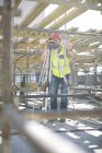 Surveyor on construction site — Stock Photo