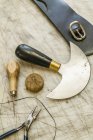 Closeup view of tools on working surface in saddlery — Stock Photo