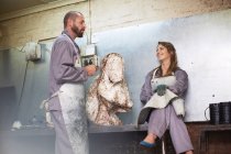 Craftspeople assembling casting mold — Stock Photo