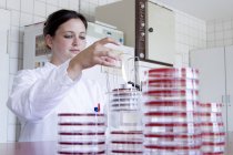 Portrait of female food analyst working in laboratory — Stock Photo