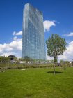 Germany, Hesse, Frankfurt, new building of European Central Bank with park in the foreground — Stock Photo