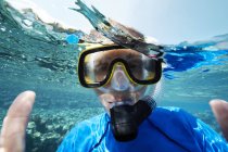 Maldives, portrait of woman snorkeling in the Indian Ocean — Stock Photo