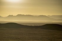 Africa, Namibia,  Sossusvlei, View to sand dunes at sunrise — Stock Photo