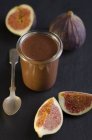Chocolate mousse with fresh figs on black background — Stock Photo