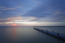 Austria,Burgenland, View of dock on Lake Neusiedl at sunrise — Stock Photo