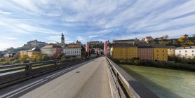 Germany, Bavaria, Landshut, View of the old town and bridge on foreground — Stock Photo