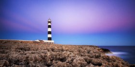 Spain, Menorca, View of lighthouse at dawn — Stock Photo