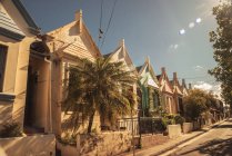 Australia, New South Wales, Sydney, Newtown, row of old residential houses at sunlight — Stock Photo