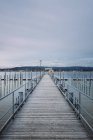 Germany, Baden-Wuerttemberg, Lake Constance and wooden jetty — Stock Photo