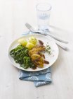 Quail breast with boiled potatoes and sweetheart cabbage — Stock Photo