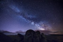 Milky way over ancient granite rocks — Stock Photo