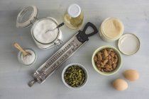 Thermometer and ingredients for making turron, elevated view — Stock Photo