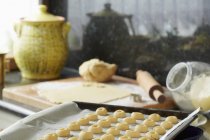 Closeup view of preparation of Christmas cookies at kitchen — Stock Photo