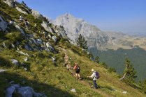 Europe, Montenegro, hikers climbing on Komovi Mountains — Stock Photo