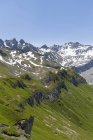 Schweiz, Graubünden, grafiersee mit madrisa, ratikon und ratschenfluh im Hintergrund — Stockfoto
