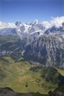 Switzerland, Bernese Oberland, Schiltenhorn cable car with Jungfrau-Aletsch-Bietschhorn world heritage site — Stock Photo