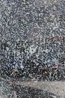 Broken glass window on telephone booth, close up — Stock Photo
