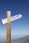 Spain, La Palma,Text on wooden sign post — Stock Photo