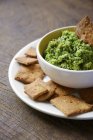 Bowl of dip made from peas — Stock Photo