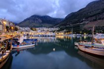 Italy, Sicily, Trapani, Castellammare del Golfo, Harbour in the evening — Stock Photo