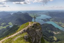 Austria, Salzkammergut, Mountain Schafberg, View from Himmelspforte with summit cross — Stock Photo