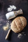 Spelt bread and ingredients for preparing spelt bread — Stock Photo