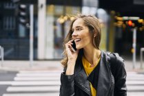 Laughing woman on the phone — Stock Photo