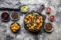 Superfood salad, avocado, beetroot, roasted chickpea, sweet potatoe, beluga lentil and blood orange — Stock Photo