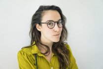Portrait of young woman wearing glasses — Stock Photo
