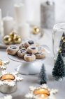 Christmas Cookies with jam filling on cake stand — Stock Photo