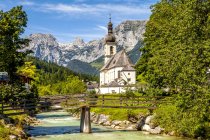 Germany, Bavaria, Ramsau, church near a river — Stock Photo
