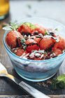 Watermelon salad with eschalot, mint, olive oil and balsamico in bowl — Stock Photo