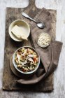 Bowl of porridge with bell pepper, champignon and parmesan — Stock Photo