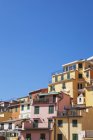 Italia, Liguria, Cinque Terre, Riomaggiore, Riviera di Levante, casas típicas y arquitectura, casas de colores típicos - foto de stock