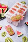 Homemade watermelon kiwi ice lollies — Stock Photo