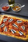 Pizza Marinara with anchovies — Stock Photo