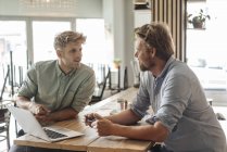 Business partners having a meeting in their new start-up company — Stock Photo