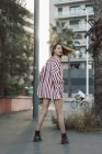 Portrait of woman wearing striped shirt — Stock Photo