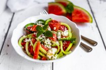 Bowl of salad with watermelon, cucumber, feta and mint — Stock Photo