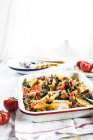 Casserole with potatoes, spinach, tomatoes and chorizzo — Stock Photo