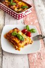 Vegetarian lasagne bolognese with basil and tomato — Stock Photo