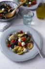 Mediterranean orecchiette with tomatoes, olives, mozzarella — Stock Photo