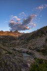 Italy, Trentino, Rendena valley, Cima Cornisello and lake Cornisello at sunrise — Stock Photo