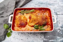 Tuscan pork fillet in gratin dish from above — Stock Photo