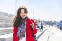 Russia, Moscow, portrait of beautiful young woman in the city — Stock Photo
