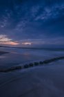 Germany, Mecklenburg-Western Pomerania, Zingst, beach in the evening, breakwater — Stock Photo