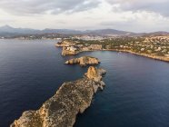 Spain, Mallorca, Region Calvia, Aerial view of Isla Malgrats and Santa Ponca at dusk — Stock Photo