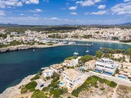 Spain, Baleares, Mallorca, Porto Cristo, Cala Manacor, coast with villas and natural harbour — Stock Photo